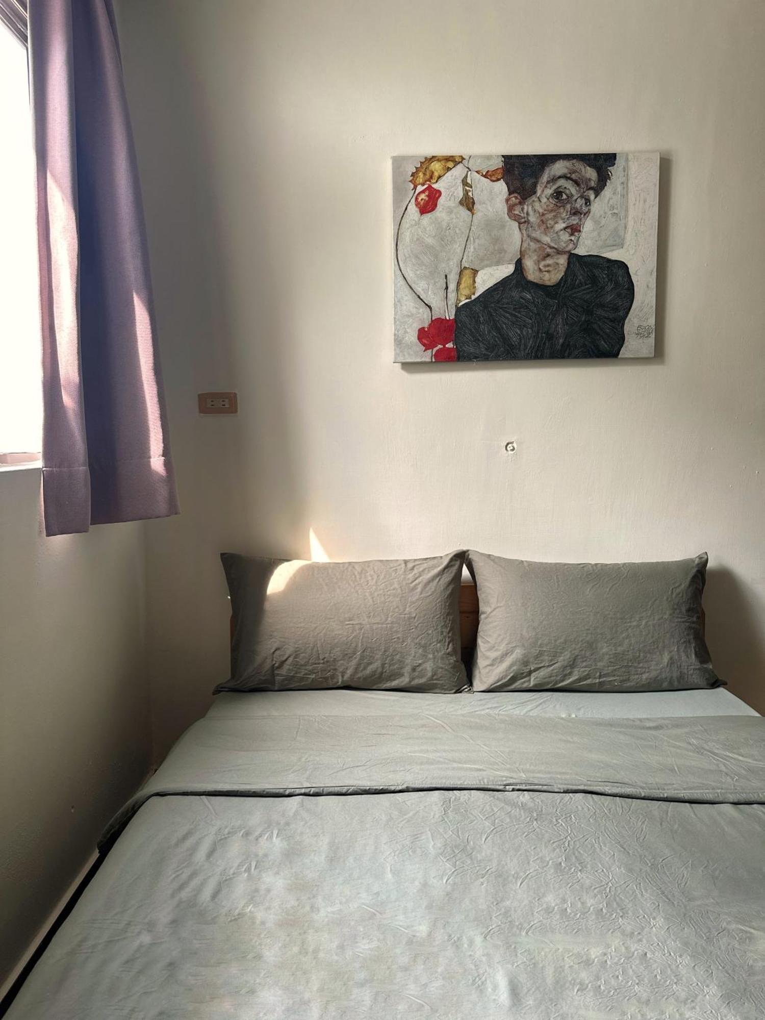 Dulan The Travel Bug Bistro Inn Donghe Bagian luar foto